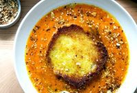 Golden Velvet Carrot Saffron Soup with Almond Dukkah Crunch