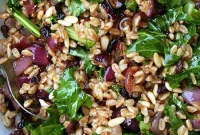 Farro Salad with Crunchy Pine Nuts, Sweet Currants, and Peppery Greens