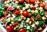 Herbed Chickpea Salad with Tomatoes, Cucumbers, and Toasted Pine Nuts