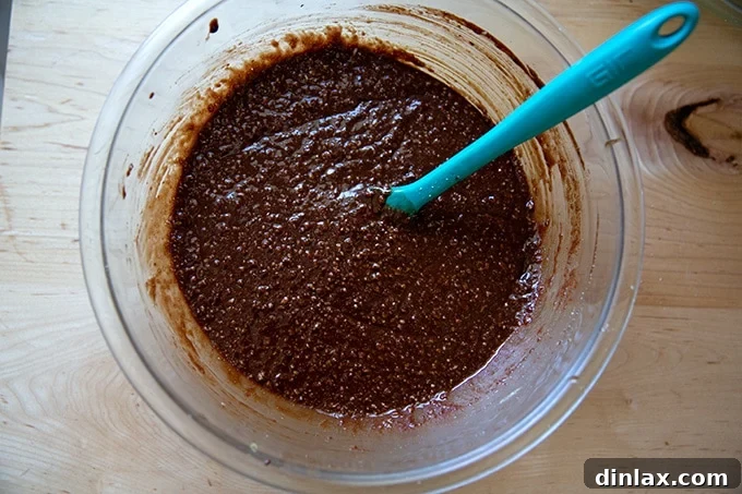 Classic Caprese Flourless Chocolate Almond Torte 9 The dark, glossy Torta Caprese batter, now seasoned with salt and Grand Marnier, awaiting the final addition of egg whites.