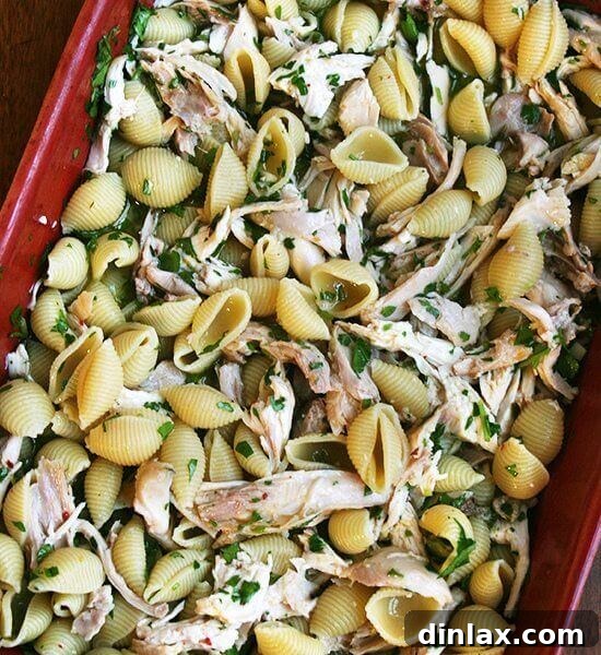 Baked pasta with chicken, lemon, white wine, and herbs.