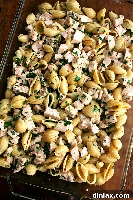 Make-Ahead Lemon & White Wine Chicken Pasta 9 A 9x13-inch baking dish filled with the fully baked pasta with chicken, lemon, and white wine, ready to serve.