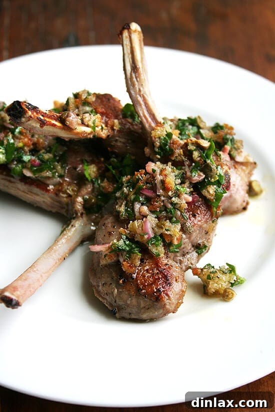 A plate of perfectly cooked pan-seared lamb chops with toasted bread crumb salsa. Made with shallots, bread crumbs, olive oil, capers, anchovies, parsley and thyme, this bread crumb salsa could be served with anything from pan-seared lamb chops to grilled steak. Yum. // alexandracooks.com