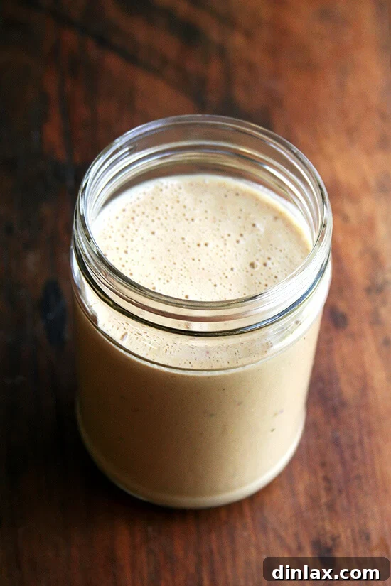 Creamy homemade peanut dressing in a bowl