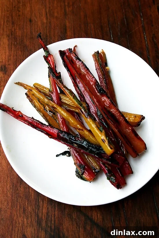 The elegant tin of salt-packed anchovies, highlighting its potential for repurposing and the delicious stems it inspires.