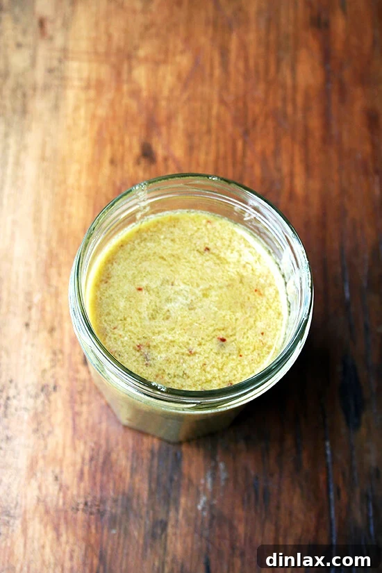 A bowl of rich, savory anchovy vinaigrette, ready for dressing.