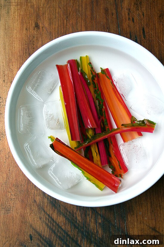 Blanched Swiss chard stems, vibrant and tender, prepared for grilling.