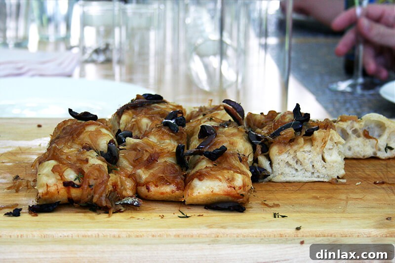 Lahey Pizza Dough Rescue: Pissaladière and Focaccia 10 A beautiful Provençal-style lunch spread with pissaladière, evoking a festive spring day.