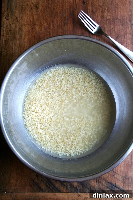 Soaked bulgur after absorbing water, showing its plumped texture.