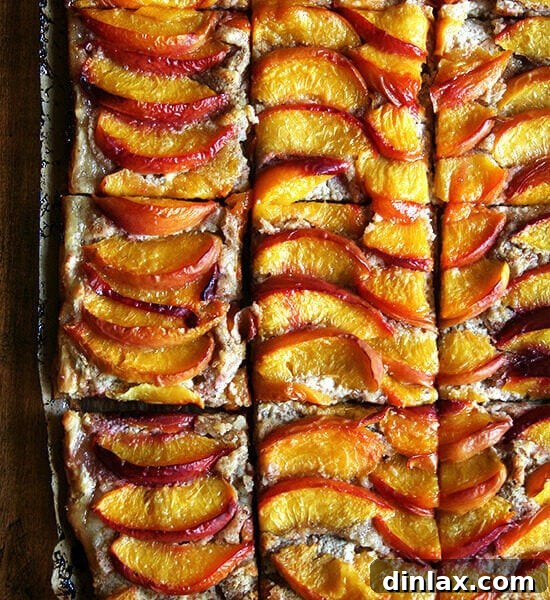 The finished Peach Frangipane Tart, a perfect dessert for summer gatherings.