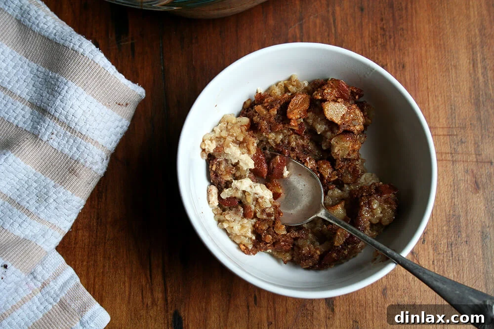 Wholesome Baked Steel Cut Oats 12 A single, inviting bowl of baked steel cut oatmeal, showcasing its golden crust and creamy interior.