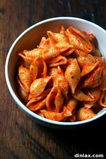 Vibrant red pepper-tomato sauce ready to be served with pasta