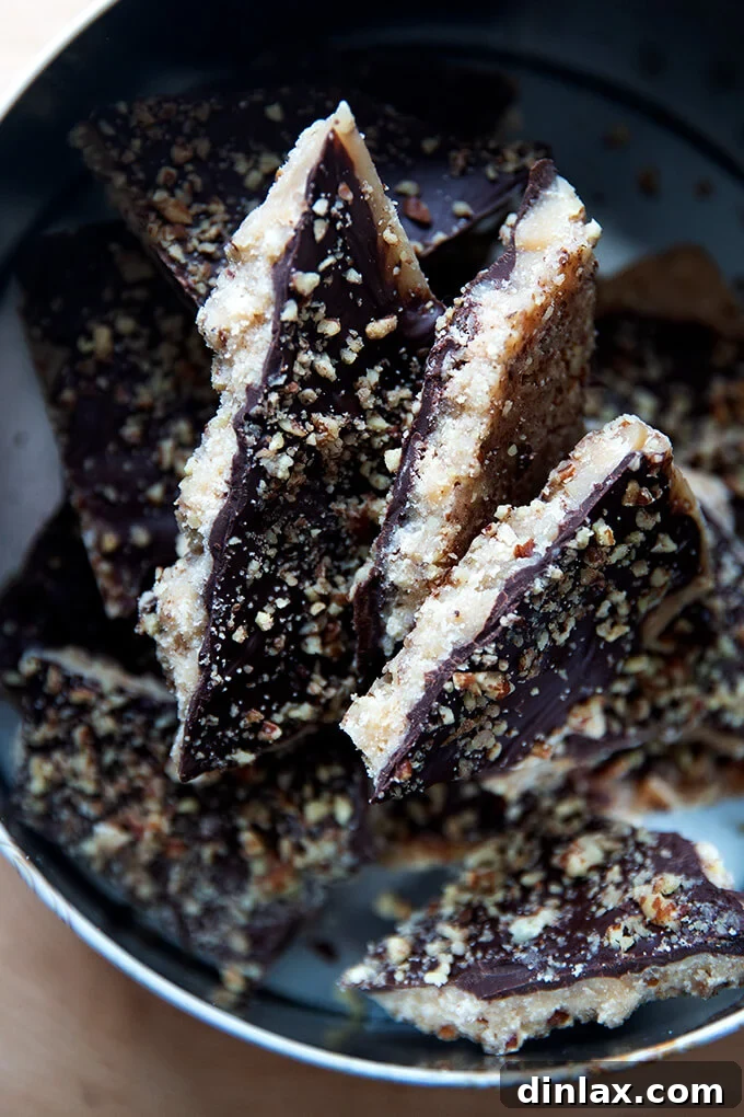 Decadent Milk or Dark Chocolate Toffee 12 Milk chocolate toffee in a holiday cookie tin.