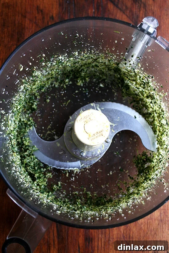 Ina Garten Zesty Roasted Chicken 3 The herb mixture — garlic, thyme, lemon zest, salt — all blended together in a food processor.