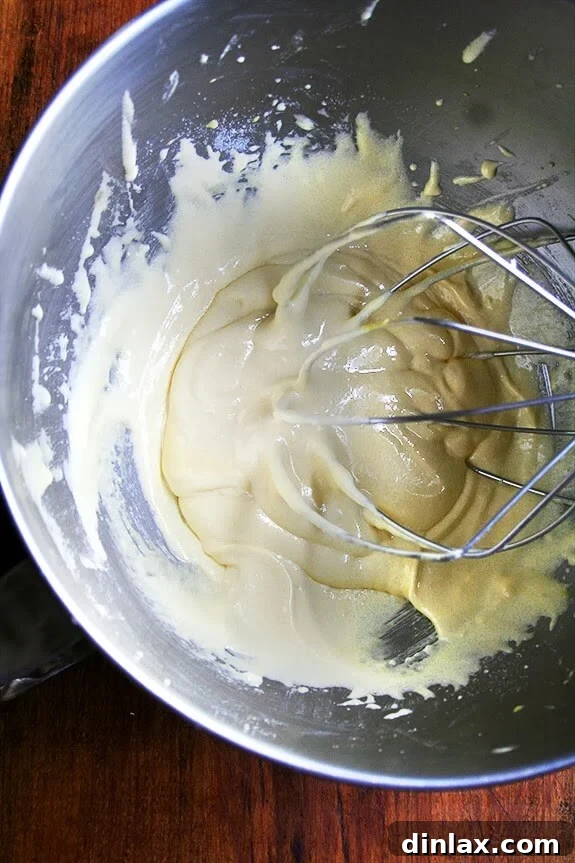 Uplifting Delight 4 Mixing Mascarpone into Egg Yolk Mixture