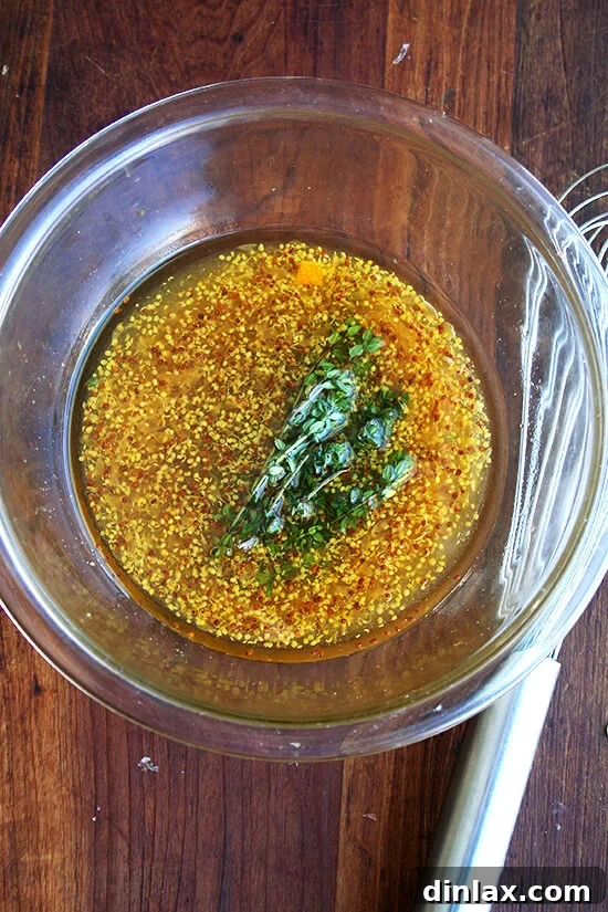 Clementine-Kissed Roast Chicken 5 A bowl of the prepared sauce for the clementine roast chicken, ready for coating.