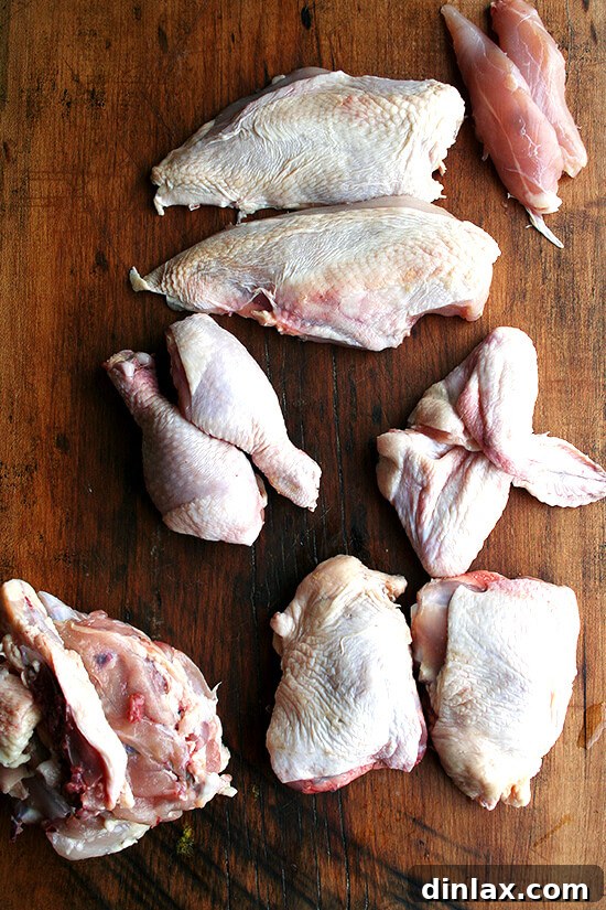 Fresh chicken pieces, ready for teriyaki preparation.