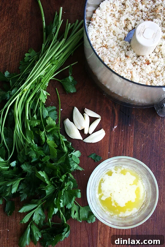 Golden Crispy Macaroni Cheese Bake 3 Close-up of golden, herb-speckled bread crumb topping for mac n cheese