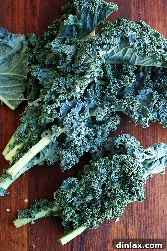 Fresh, vibrant green kale leaves, ready for chopping.