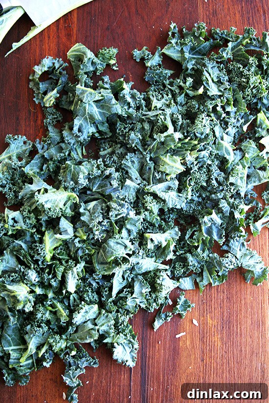 Finely chopped kale, prepared for mixing into the pasta gratin.