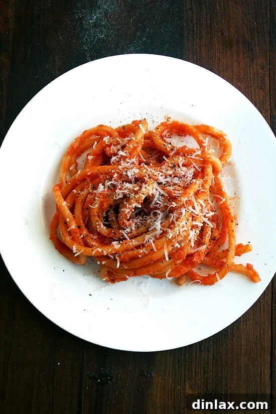Roasted with butter, anchovies and a lot of garlic, canned tomatoes transform into an incredibly tasty, easy-to-make, all-purpose tomato sauce. This final image presents the dish ready to eat.