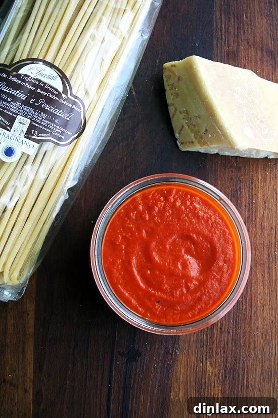 Close-up of the rich, red butter-roasted tomato sauce in a bowl, ready to be served.