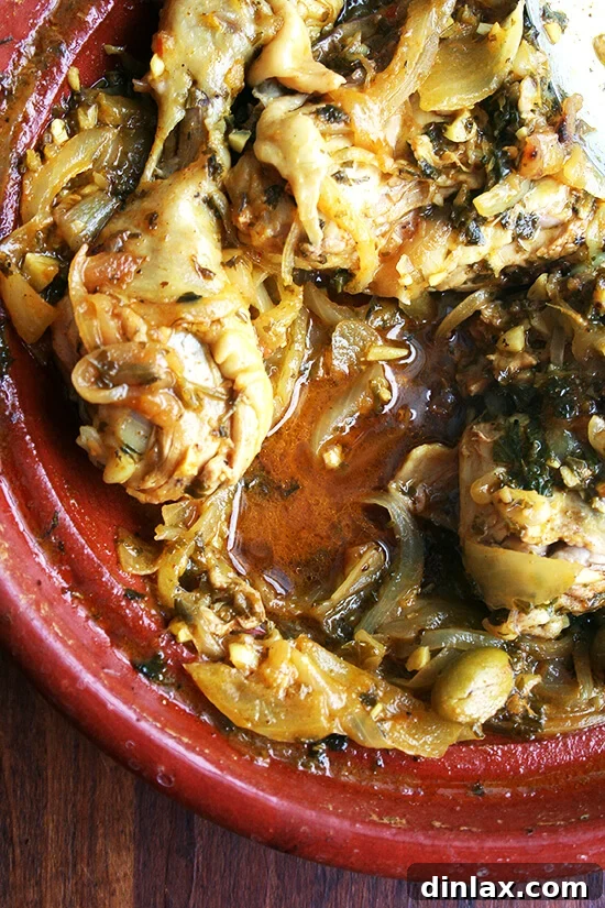 Rich, bubbling juices in a chicken tagine