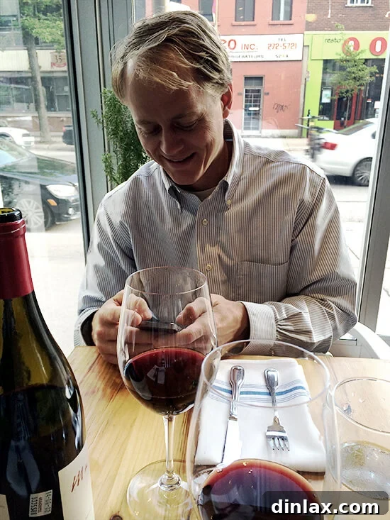 A person checking a hockey score, indicating local sports interest.