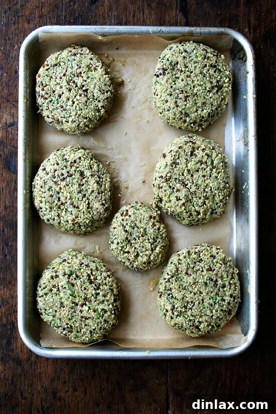 Plant-Powered Chickpea Quinoa Burgers 10 Carefully formed chickpea and quinoa veggie patties on a tray