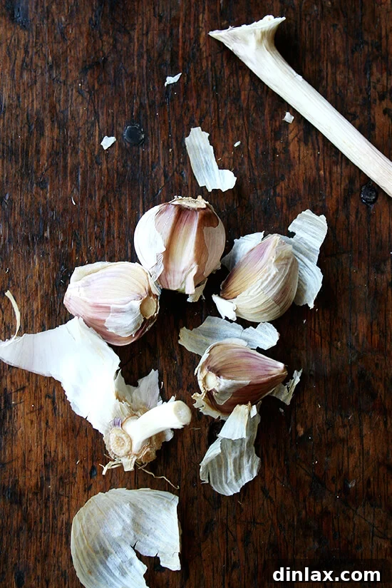 Tangy Swiss Chard Salad with Parmesan and Crunchy Breadcrumbs 10 A head of garlic expertly split into its individual large cloves, ready for mincing.