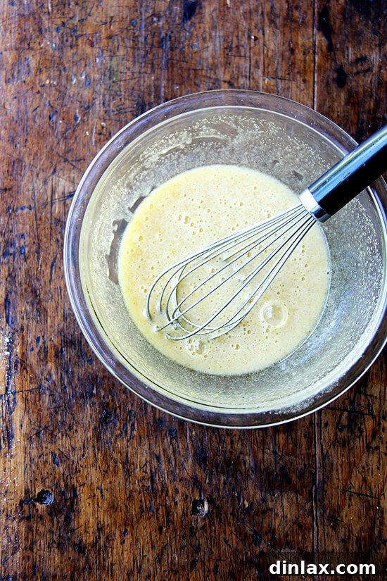 Smooth, creamy vanilla custard mixture, prepared and ready to be poured over the peaches.
