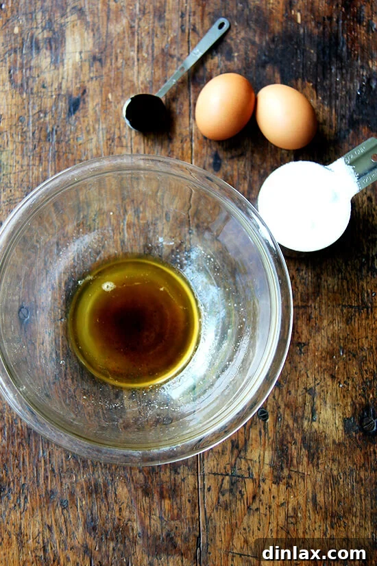 Key ingredients for the vanilla custard: butter, sugar, eggs, vanilla bean paste, and salt, laid out for preparation.