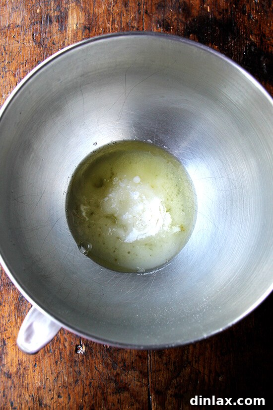 Raw ingredients for homemade fluff: egg whites, sugar, cream of tartar, and sea salt, ready to be whipped.