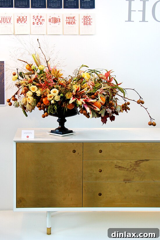 Exquisite flower arrangement adorning a beautifully set table at the American Made Summit.