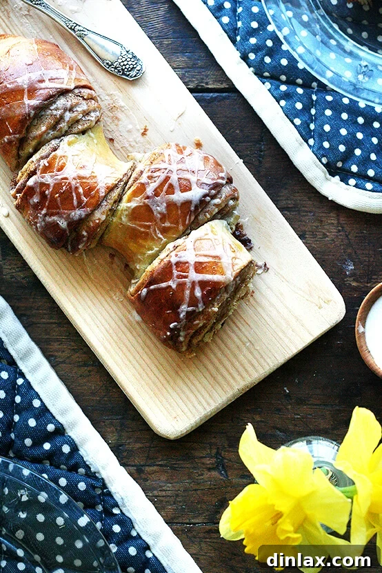 A beautifully set brunch table featuring quilted placemats and vintage silverware from Provisions by Food52.