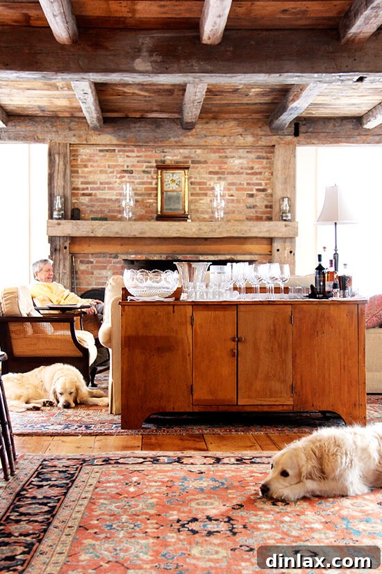 A charming farmhouse in Vermont, with golden retrievers peacefully sleeping in the foreground.