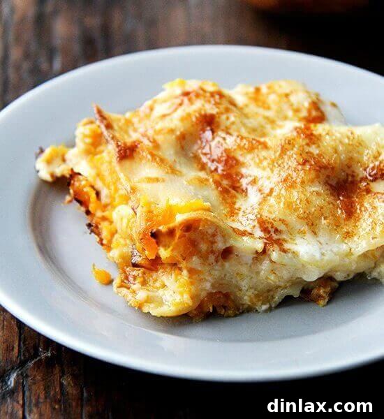 A slice of butternut squash lasagna on a plate.