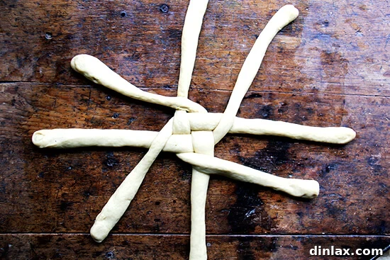 Step 3: Completing the round Challah bread braid, ready for the egg wash.