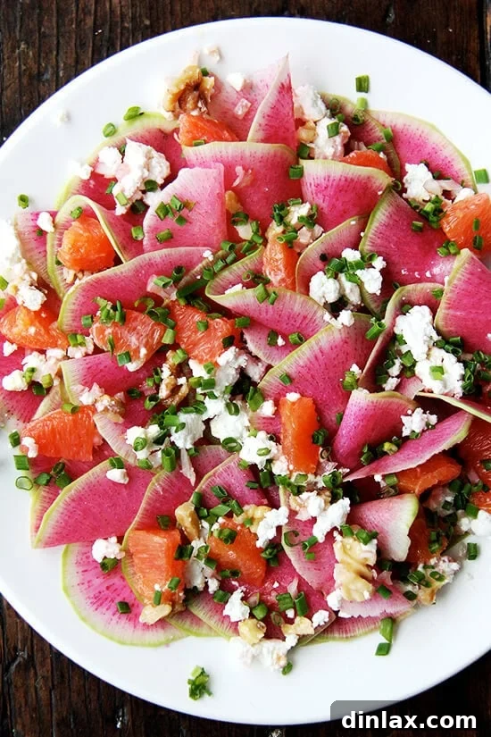 This beautiful salad is a mix of paper-thin watermelon radishes, Cara Cara oranges — so sweet and pretty — toasted walnuts and goat cheese, dressed with shallots macerated in vinegar, olive oil, and chives. If you don't have radishes on hand, turnips work, too, and so do beets (cooked first, though raw might be interesting? and messy?). // alexandracooks.com Vibrant Watermelon Radish and Cara Cara Orange Salad with Goat Cheese and Toasted Walnuts.