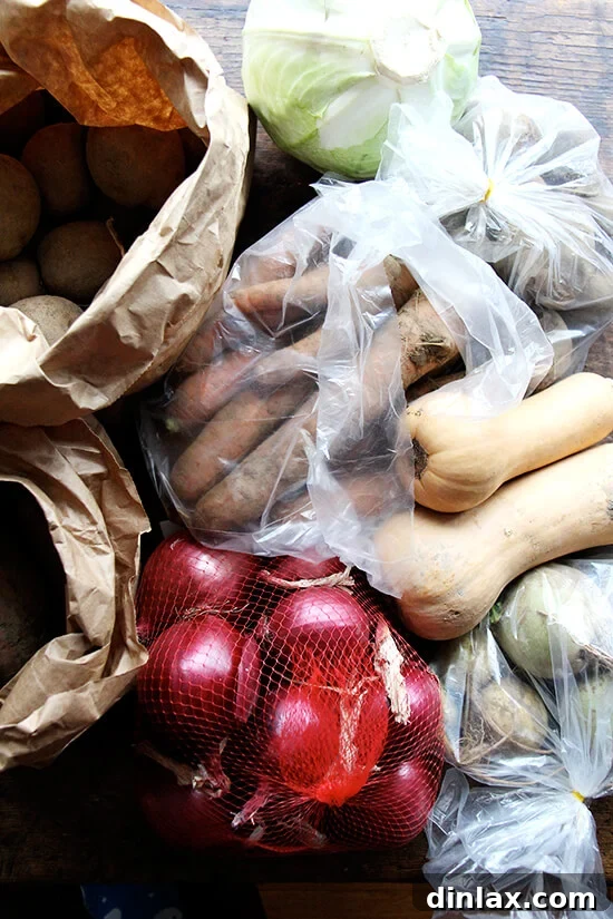 Vibrant Watermelon Radish, Orange, and Goat Cheese Salad 7 A bounty of fresh winter vegetables, including various root vegetables, from a CSA box.