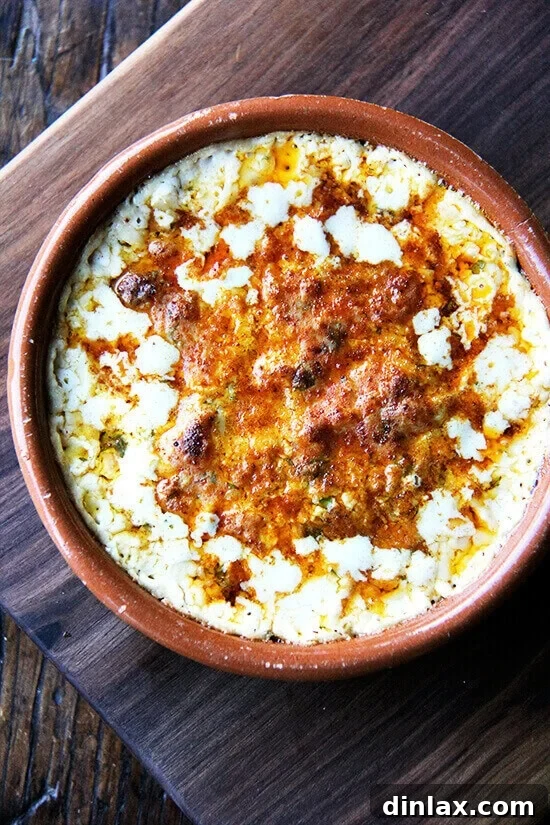 Delicious hot crab dip, perfect for entertaining and family gatherings. A bowl of hot crab dip, rich and creamy, spiced with Old Bay and Worcestershire, and loaded with crab. Perfect for sharing.