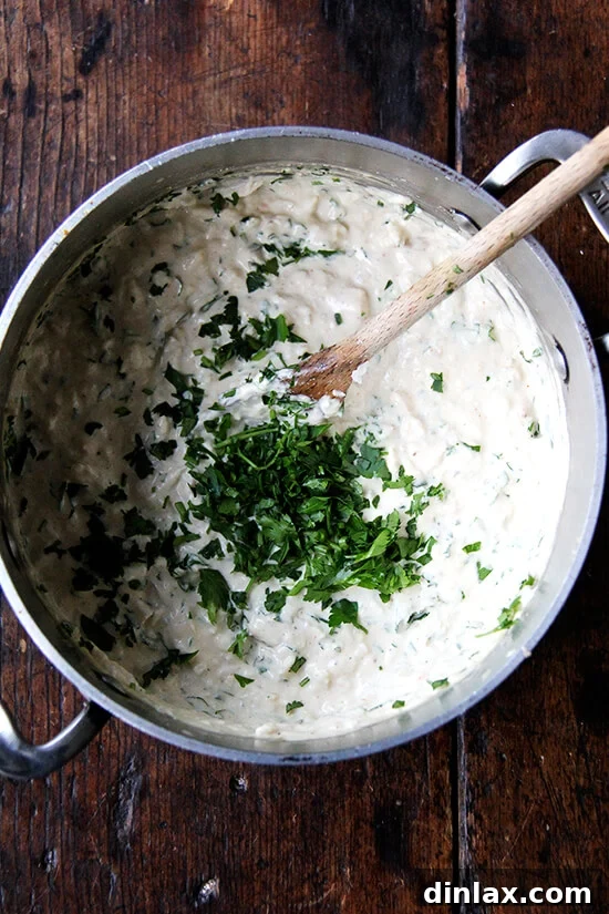 Martha Stewart's Legendary Hot Crab Dip 5 All the creamy, cheesy, and spiced ingredients for the hot crab dip thoroughly mixed together in a large bowl, ready for transfer to a baking dish.
