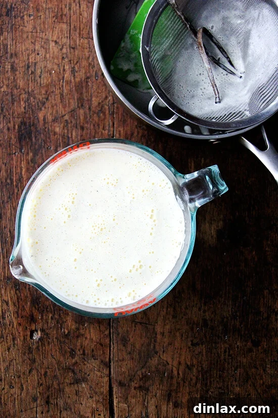 Velvet Vanilla Bean Custard 7 Smooth, strained custard mixture, free of any imperfections, prepared for baking in a water bath.