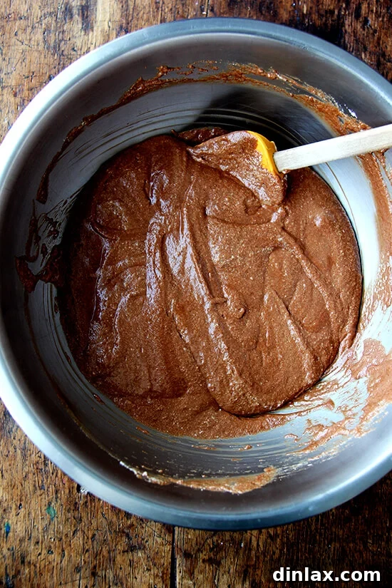 Julia Child's Signature Chocolate Mousse 6 A large mixing bowl filled with the fully combined chocolate mousse mixture, showing its smooth, rich texture before chilling.