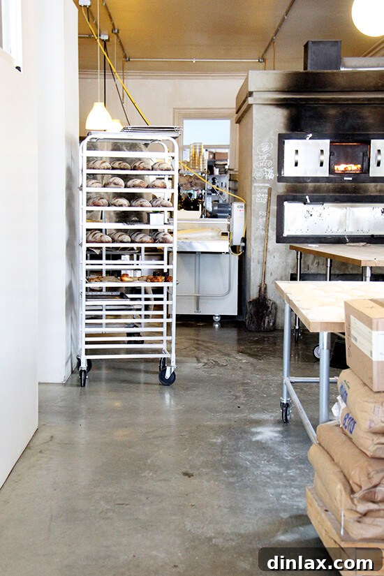 Fresh Threads of Vergennes 18 The bustling kitchen area of Vergennes Laundry, hinting at the baking process