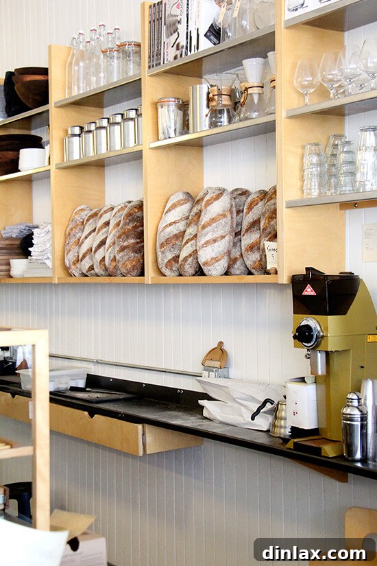 Fresh Threads of Vergennes 14 Freshly baked bread cooling on shelves, ready for customers