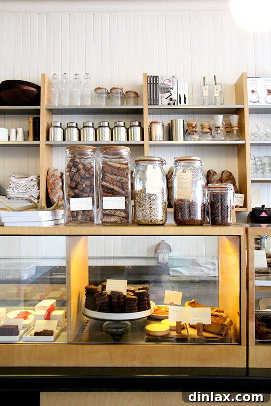 Fresh Threads of Vergennes 21 The front counter of Vergennes Laundry, displaying a variety of baked goods