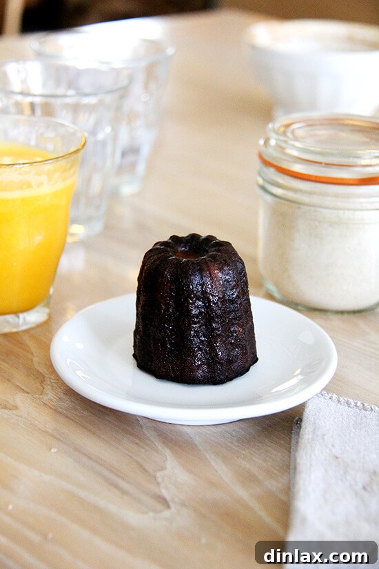 Fresh Threads of Vergennes 8 A perfectly baked canelé with its characteristic dark, caramelized crust and custardy interior