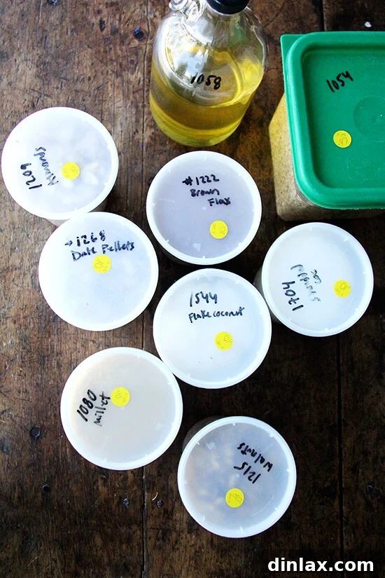 Various clear, reusable containers ideal for bulk food shopping, demonstrating an organized approach to sustainable grocery habits.