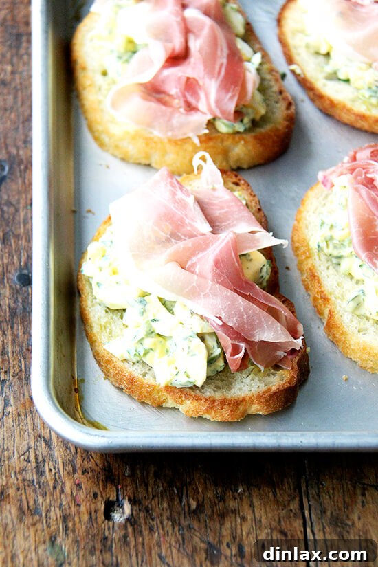 Briny Egg Salad Crostini 12 A final close-up of the delicious pickled egg salad on toast, garnished, emphasizing its freshness and enticing flavor, perfect for a light meal or appetizer.